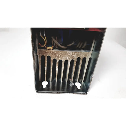 Rusty black metal heat exchanger with vertical fins and coiled wires inside for bystronic amplifier cnc02 50a product