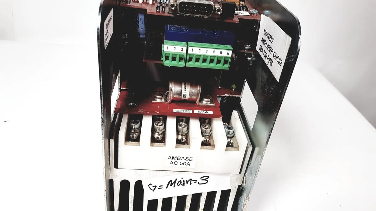 Black industrial amplifier cnc02 50a with green terminal blocks and red circuit board internals bystronic 1004872