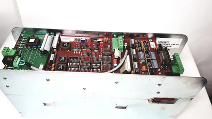 Red and green circuit board assembly housing the bystronic amplifier cnc02 50a in a white metal enclosure