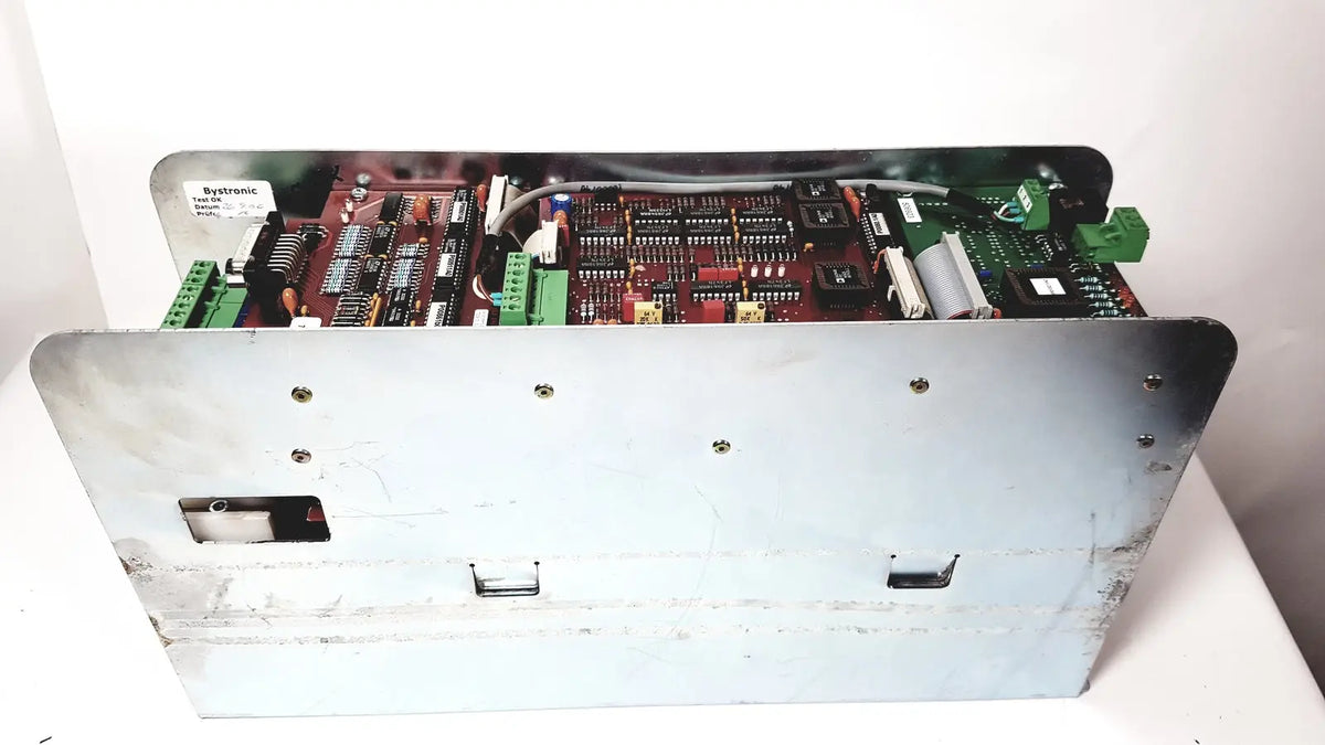 Silver metallic industrial control panel with circuit boards and green connectors for bystronic amplifier cnc02 50a
