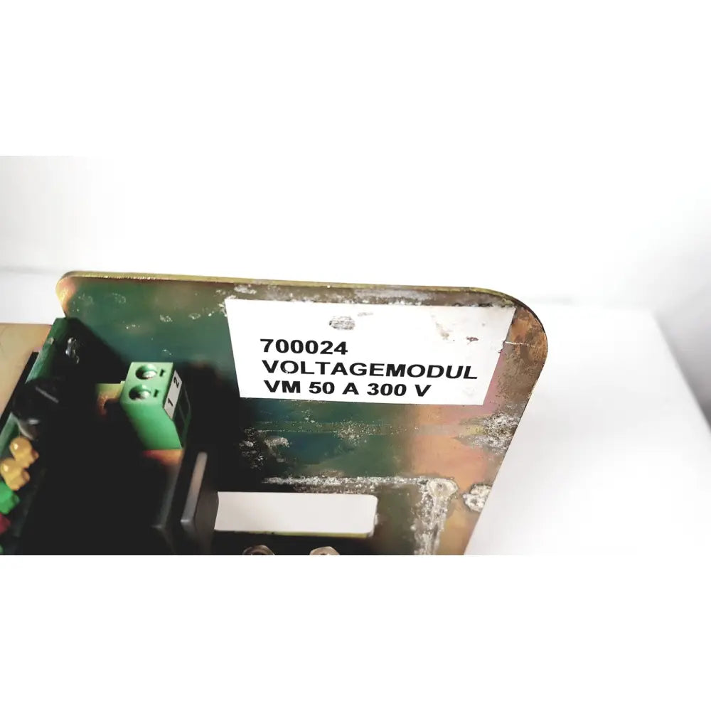 A weathered green metal bystronic module vm 50a voltage module for 50a 300v power supply applications