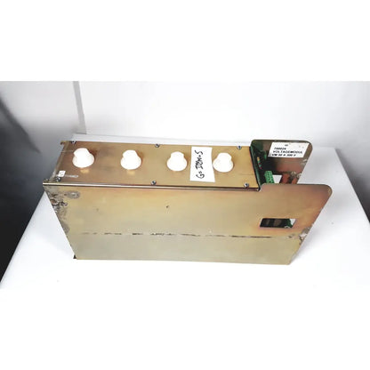 Brass-colored metal module vm 50a with four white knobs and green circuit board for 50a 300v power supply by bystronic