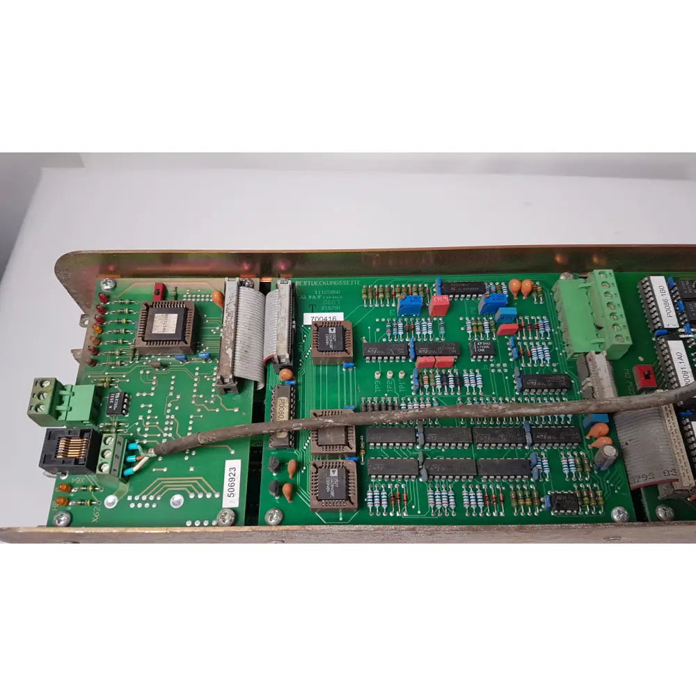 Green printed circuit board with electronic components of bystronic 702116-a amplifier ac 100 a 2000 rpm