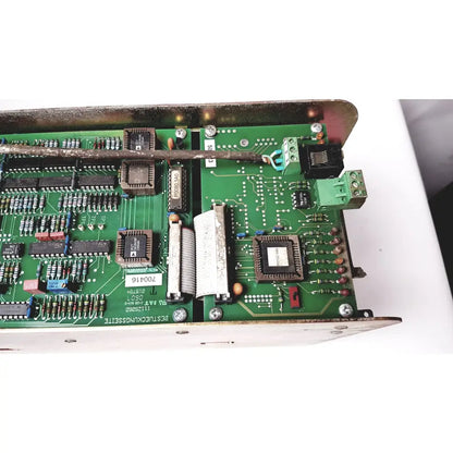Green printed circuit board with black integrated circuits and connectors in bystronic 702116-a amplifier product