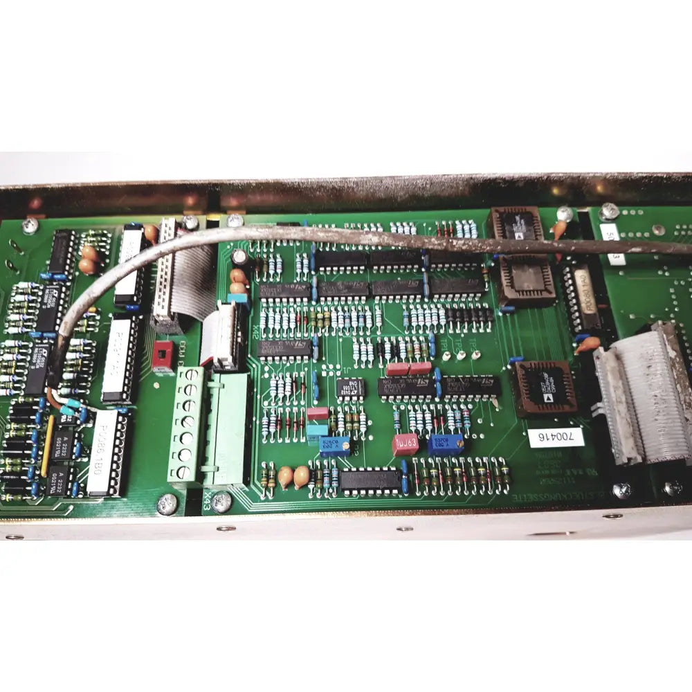 Green printed circuit board with electronic components and silver cable of bystronic 702116-a amplifier ac 100 a 2000 rpm