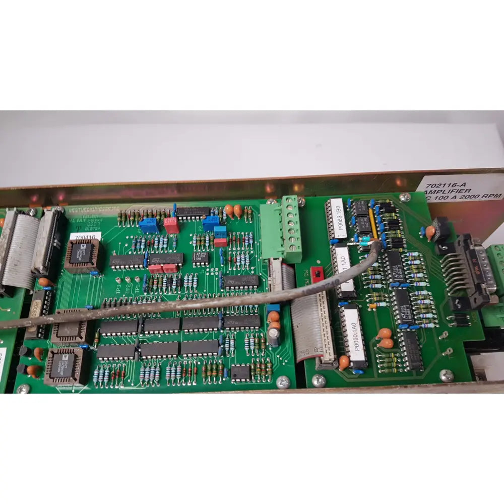 Green circuit board of bystronic 702116-a amplifier with label indicating ac 100 a 2000 rpm for industrial use
