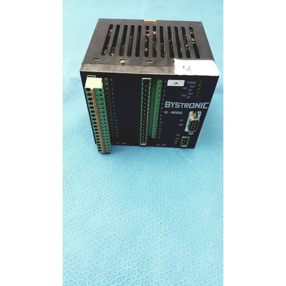 Black bystronic modul input output module showing green terminal blocks and d-sub connector on the back side