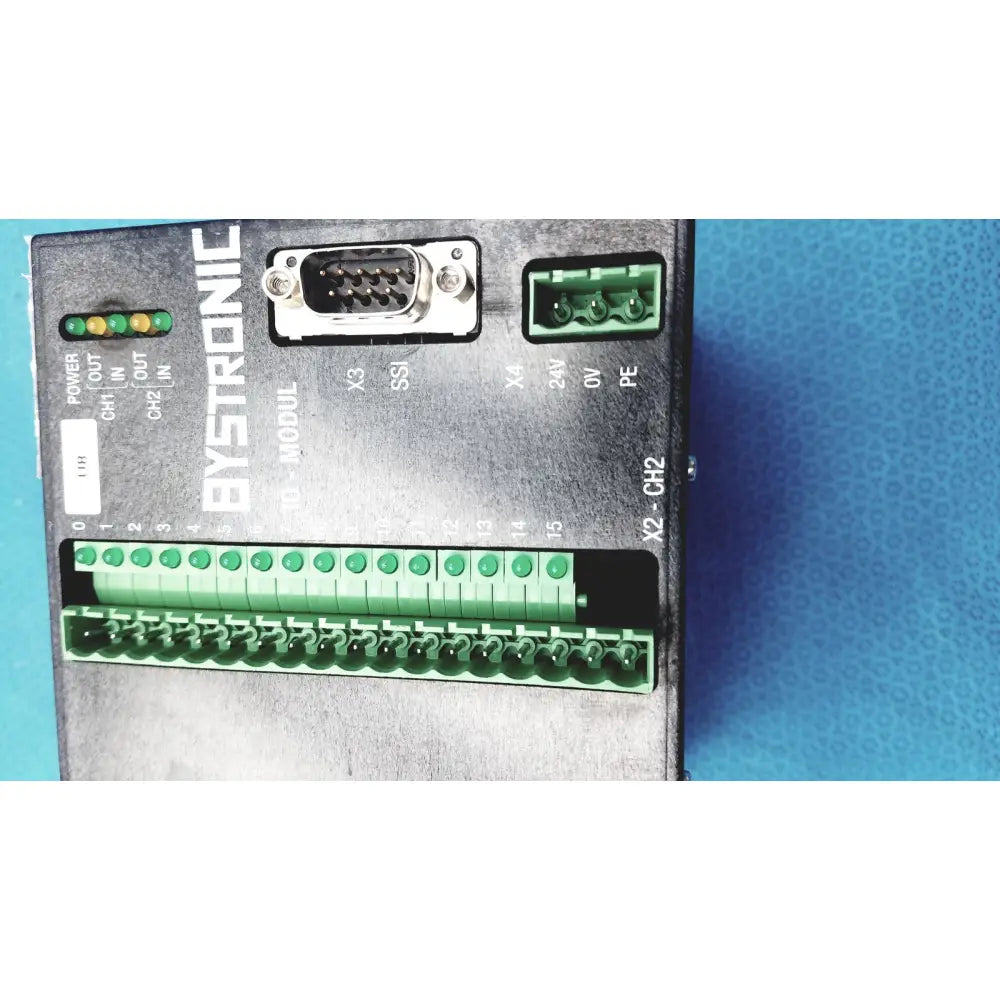 Black bystronic modul input output with green terminal blocks and db9 serial port for industrial control use
