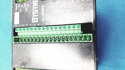 Bystronic modul input output industrial module with black metal casing green terminal blocks and labeled connectors