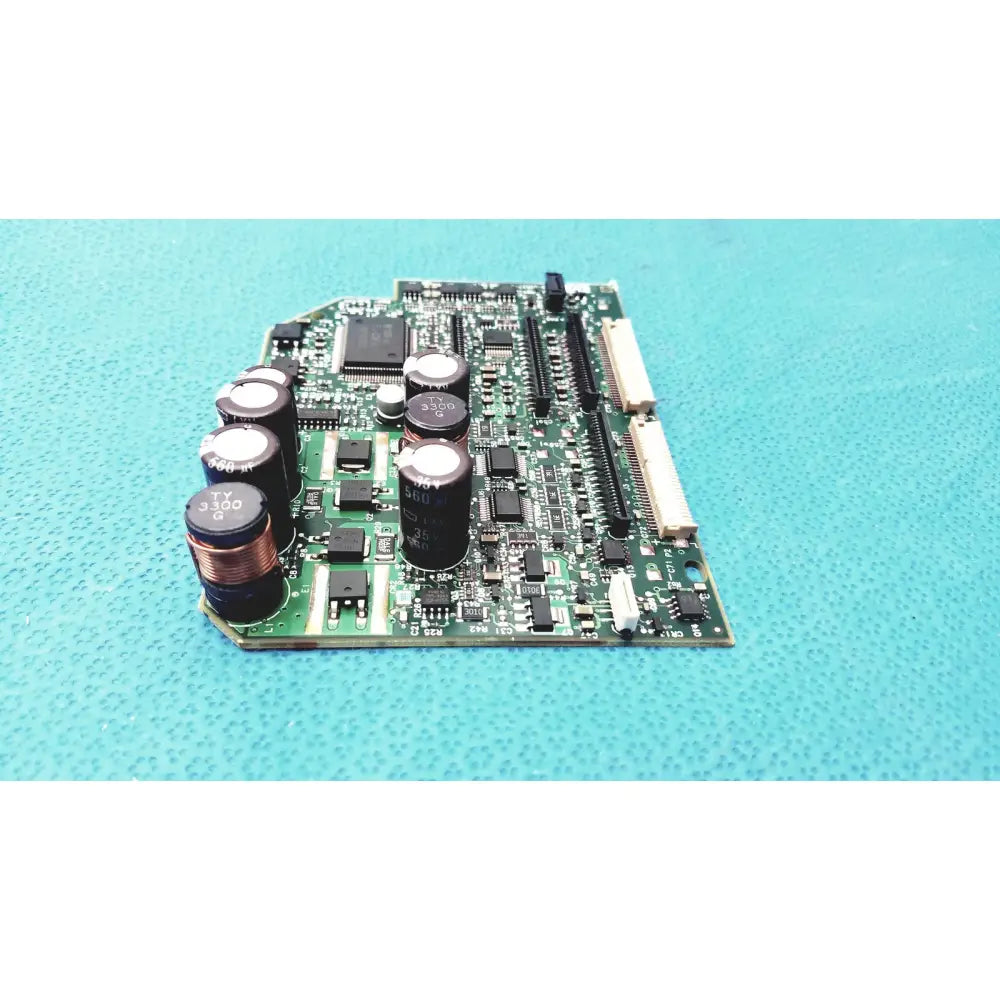 Green printed circuit board with black capacitors and components of c7769-60007 carriage pca board for hp designjet