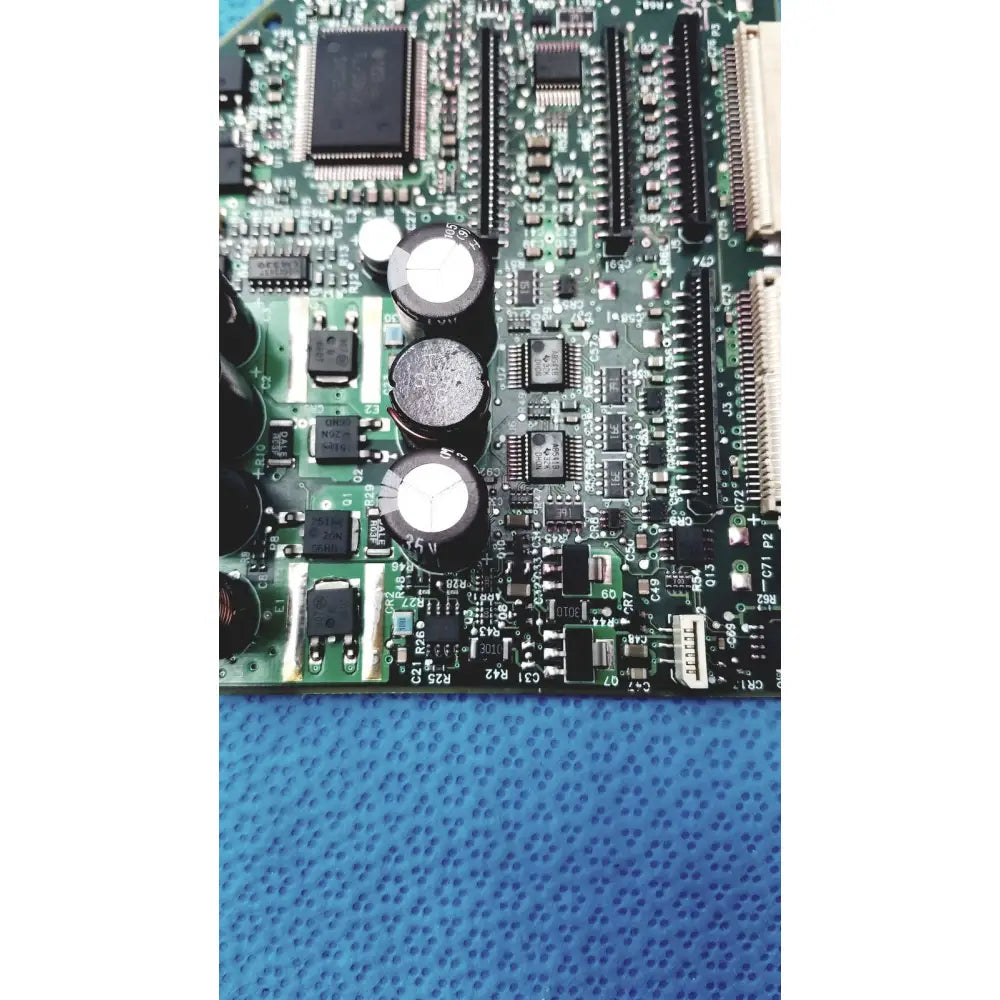 Green circuit board with black capacitors and components for hp designjet c7769-60007 carriage pca board