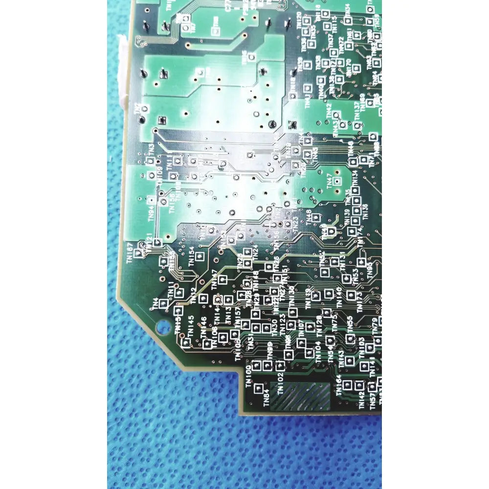 Green carriage pca board c7769-60007 with silver solder joints and white markings for hp designjet printers