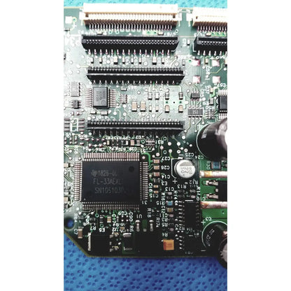 Green circuit board with black integrated circuits and components for c7769-60007 carriage pca board hp designjet