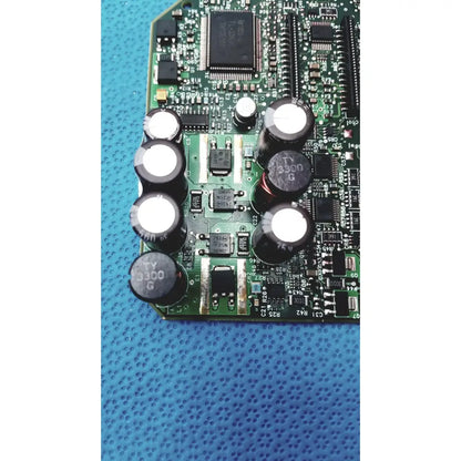 Green circuit board with black capacitors and integrated circuits of c7769-60007 carriage pca board for hp designjet