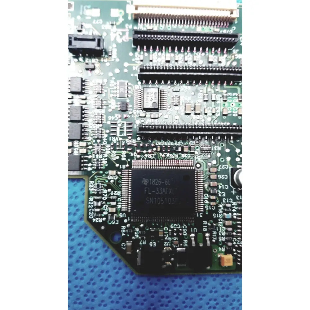 Green printed circuit board carriage pca board c7769-60007 with black integrated circuits and metallic connectors for hp designjet