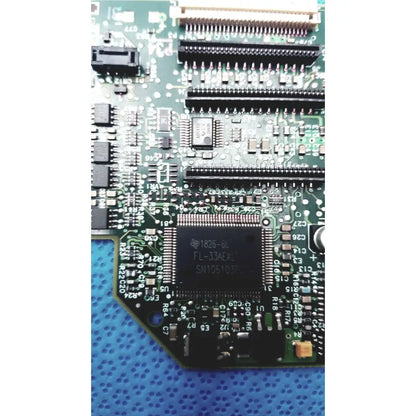 Green printed circuit board carriage pca board c7769-60007 with black integrated circuits and metallic connectors for hp designjet