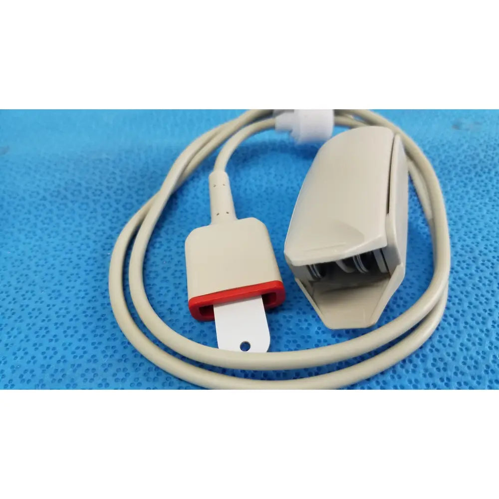 Beige adult spo2 pulse oximeter sensor s403-1250 with red connector accent and white clip for accurate monitoring