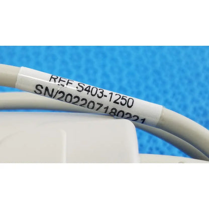 White label with black printed serial number wrapped around beige cable for adult spo2 pulse oximeter s403-1250 sensor