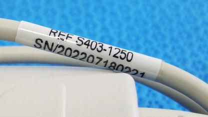 White label with black printed serial number wrapped around beige cable for adult spo2 pulse oximeter s403-1250 sensor