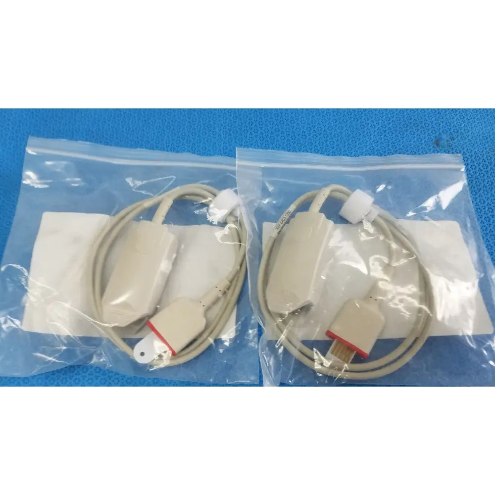 Two beige medical-grade usb-to-usb cables in plastic bags for adult spo2 pulse oximeter sensor s403-1250