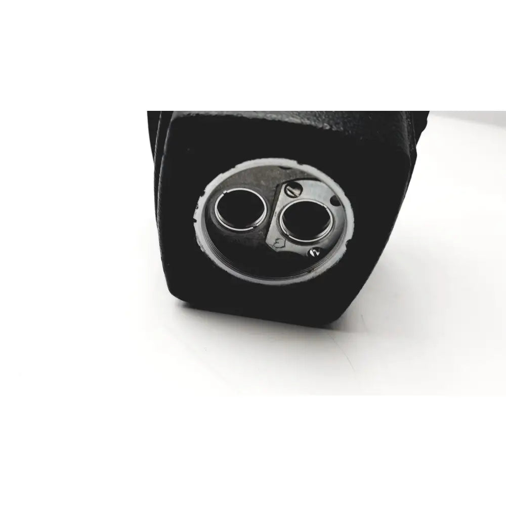 Black rectangular housing with two metallic ports and silver plate screw details on the back of cambridge instruments stereozoom 4 head replacement