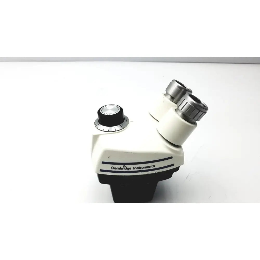 White and black Cambridge Instruments StereoZoom stereo microscope with silver eyepieces zoom range 0.7X-3.0X replacement head