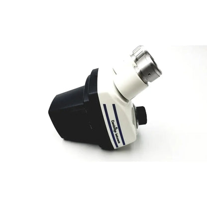 Black and white cambridge instruments stereozoom microscope with silver metallic lens housing and 0.7x-3.0x zoom range