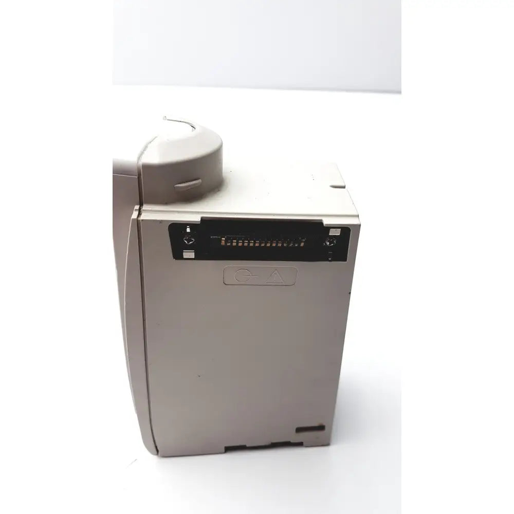 Beige plastic cardinal health alaris sp02 8200 module nellcor oximax with black control panel and circular component on top