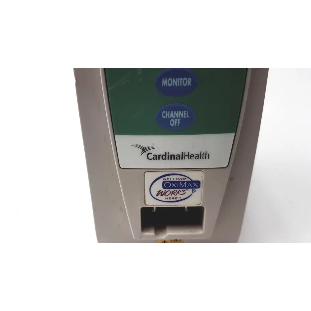Beige cardinal health alaris sp02 8200 module nellcor oximax pulse oximeter with green panel and blue circular buttons