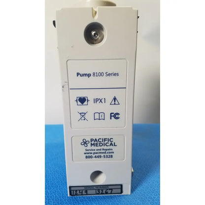 White cardinal health alaris pump 8100 series medical device with metallic screw and labeled certification icons