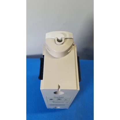 Beige plastic cardinal health alaris pump 8100 series with curved top and black side grips for medical use
