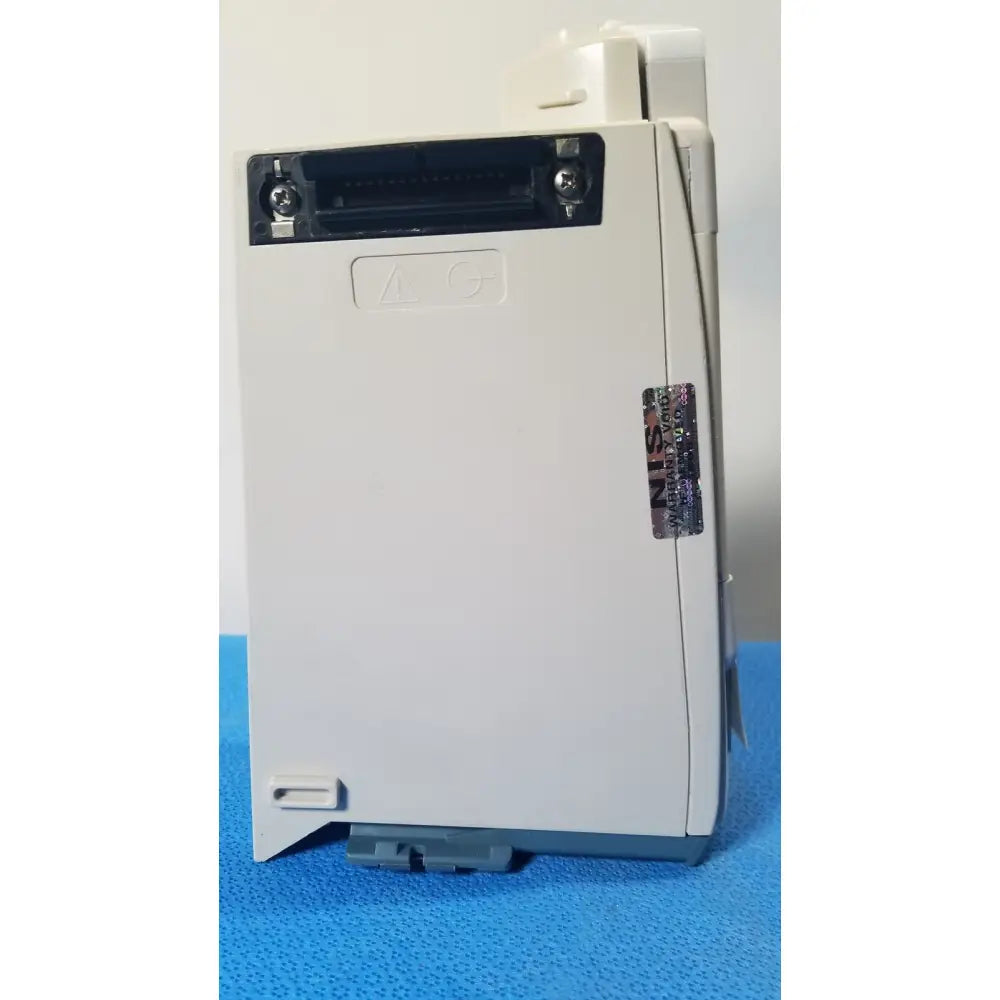 White plastic industrial control module with black connector port and gray base for cardinal health alaris pump 8100 series
