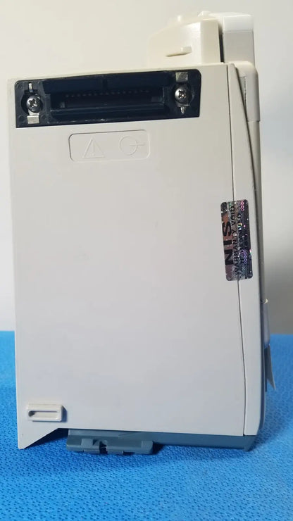 White plastic industrial control module with black connector port and gray base for cardinal health alaris pump 8100 series