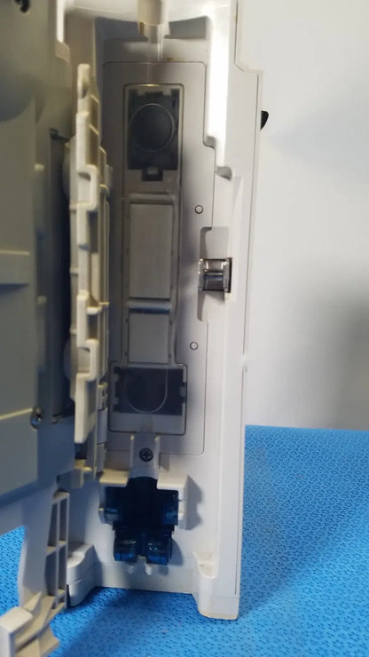 White plastic electrical outlet box with gray components and blue connectors for cardinal health alaris pump 8100 series