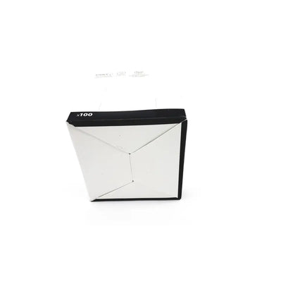 Black and white cardboard box of cardinal health gauze pads 3381g with geometric design labeled x100 on top edge