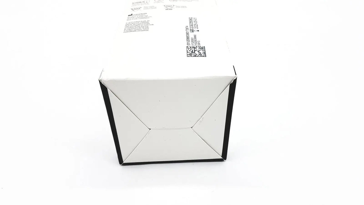 White cardboard box with black trim and printed labels containing cardinal health gauze pads 3381g health gauze pads