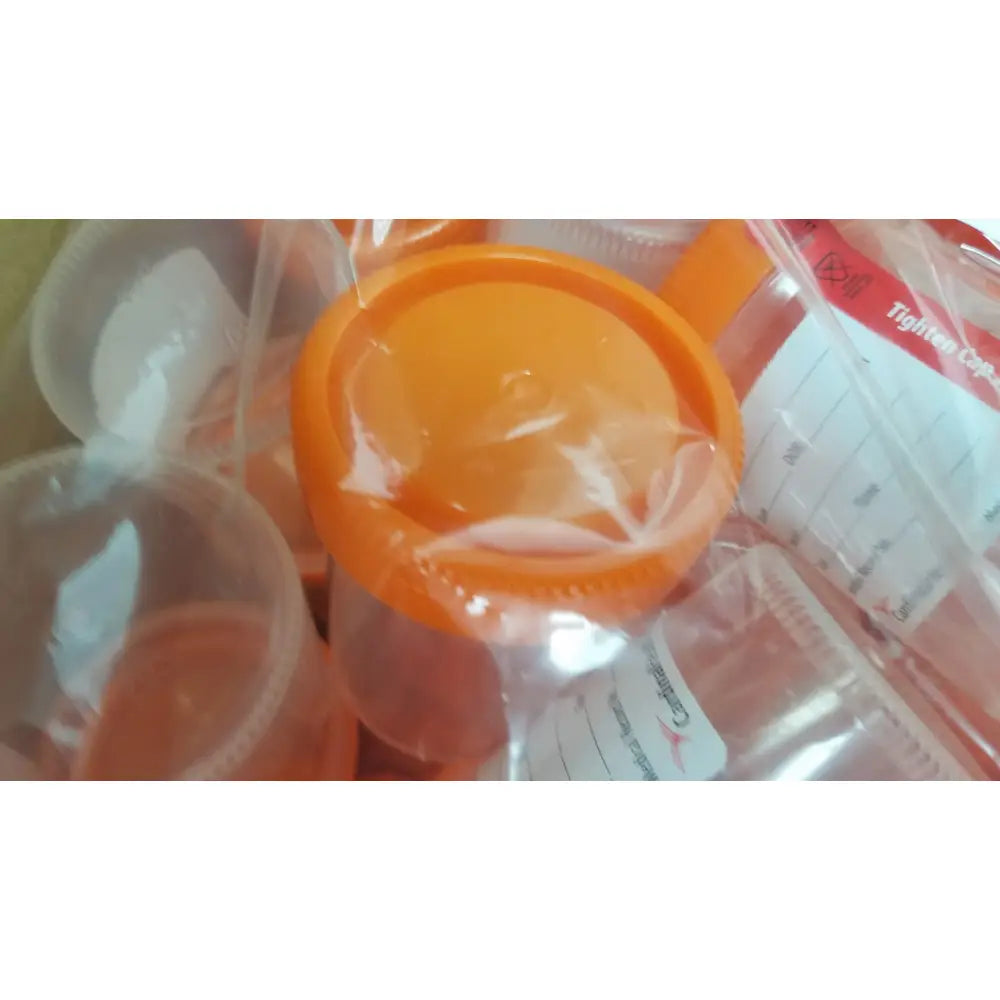 Bright orange ribbed plastic lid sealed in clear packaging for cardinal health specimen cup chb13904a 120ml 53mm