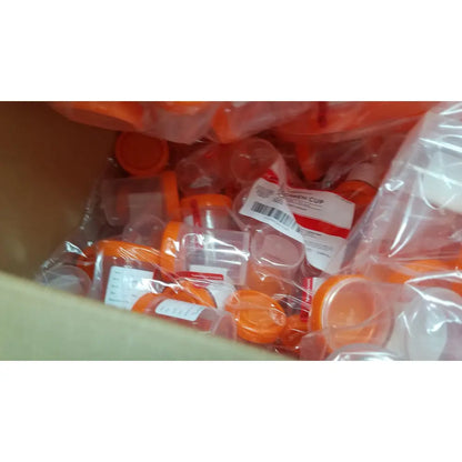 Orange plastic cardinal health specimen cup chb13904a with clear body and labeled packaging for urine collection