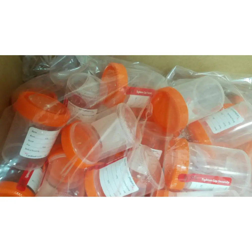Clear plastic cardinal health specimen cup 120ml with bright orange caps and white labeling stickers chb13904a