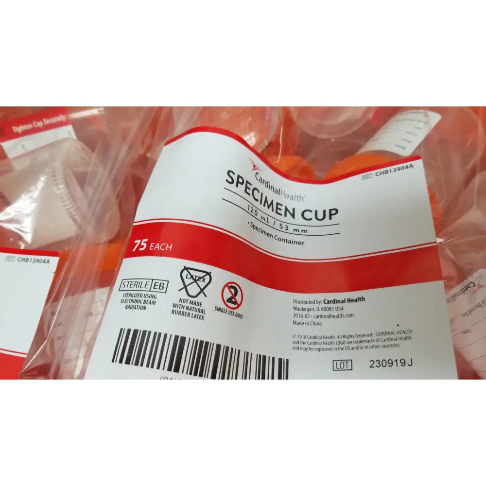 Red and white labeled cardinal health specimen cup chb13904a 120 ml capacity designed for medical use