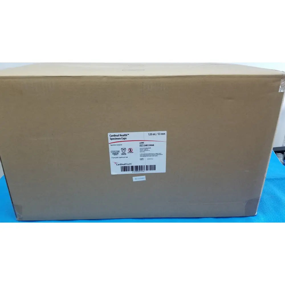 Brown cardboard box of cardinal health specimen cup chb13904a 120ml with white sticker showing product details and barcode