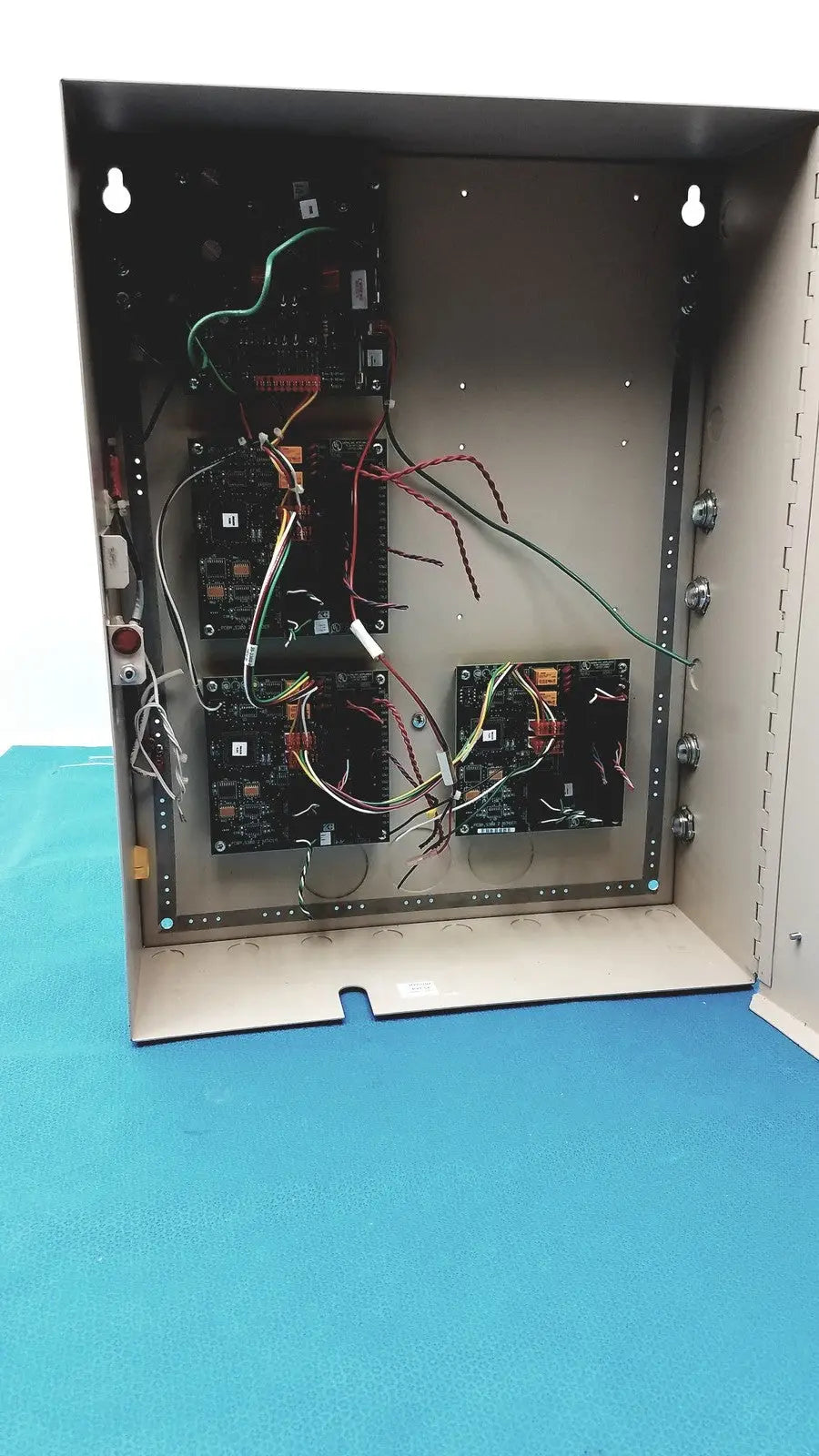 Metal access control panel s300-xl control panel controller with multiple circuit boards and colored internal wiring