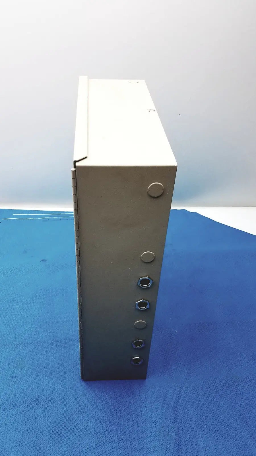 Metallic gray rectangular access control panel s300-xl with hinged lid and vertical mounting holes for secure installation