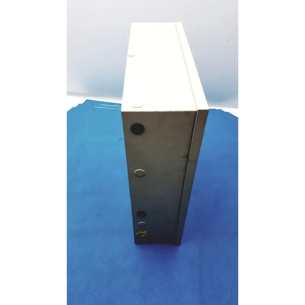 White and gray metal Cardkey S300-XL access control panel controller with three circular access ports visible