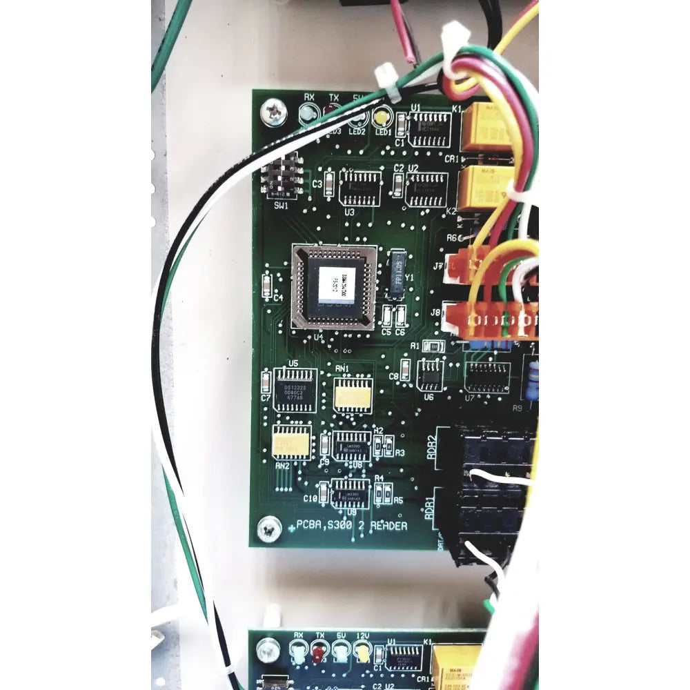 Green printed circuit board with labeled connectors for cardkey s300-xl access control panel controller