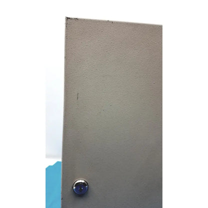 Gray textured door with circular silver keyhole for cardkey s300-xl access control panel controller