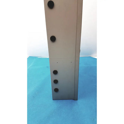 Gray metal s300-xl access control panel controller with five black circular knobs on its side for secure management