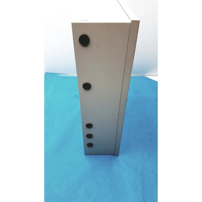 Gray metal access control panel enclosure with black circular knockouts for cardkey s300-xl control panel controller