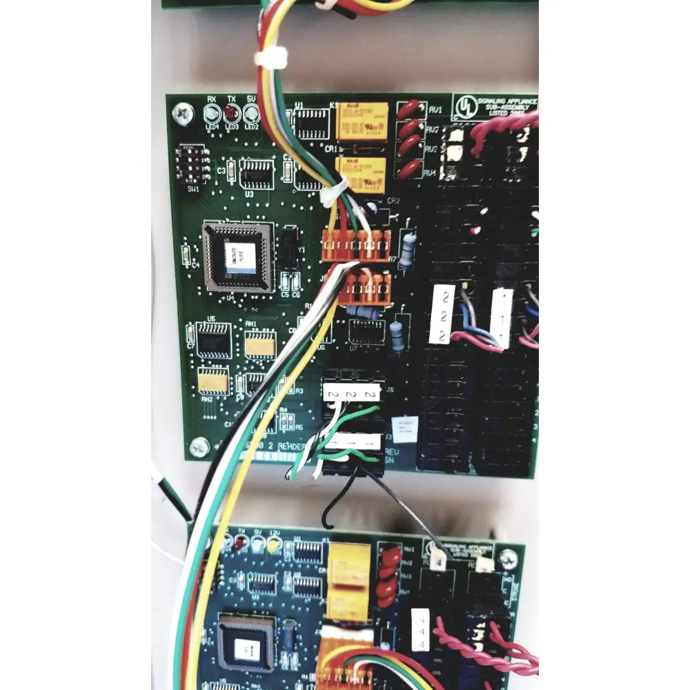 Green printed circuit board with multicolored wires of s300-xl access control panel controller no key model