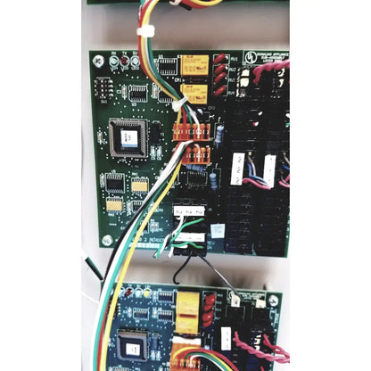 Green printed circuit board with multicolored wires of s300-xl access control panel controller no key model